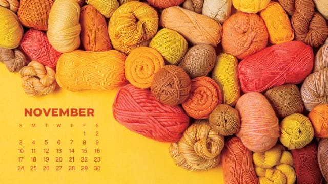 November 2019 desktop wallpaper featuring yellow and orange yarns.