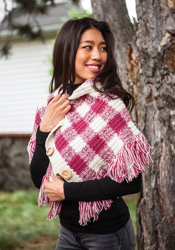 Ancel Wrap: a buffalo plaid crochet poncho made using 2 yarns held together.