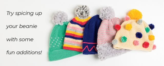 Text: "Try spicing up your beanie with some fun additions!" A pile of 5 crocheted hats in different colors, with pom poms, stripes, and fur trim.
