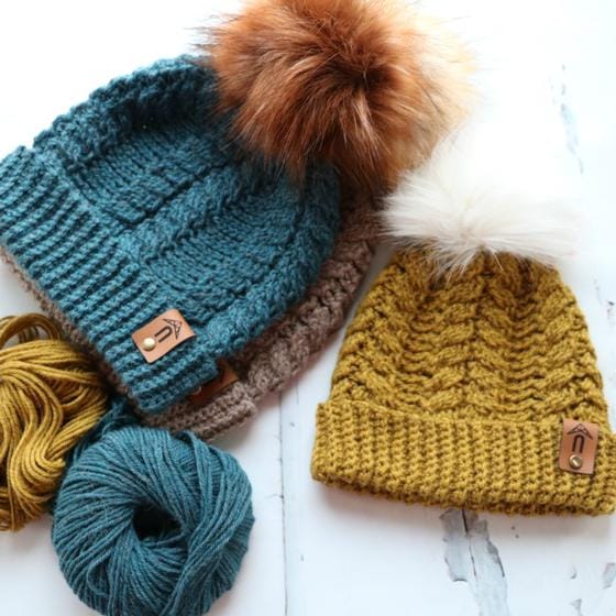 A pile of lovely crocheted hats