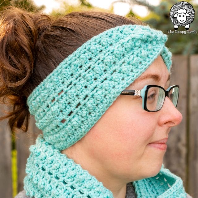 Picot Me Up Ear Warmer and Cowl Set by The Loopy Lamb. Ashley models a light aqua-colored crocheted headband and cowl with lots of good texture.
