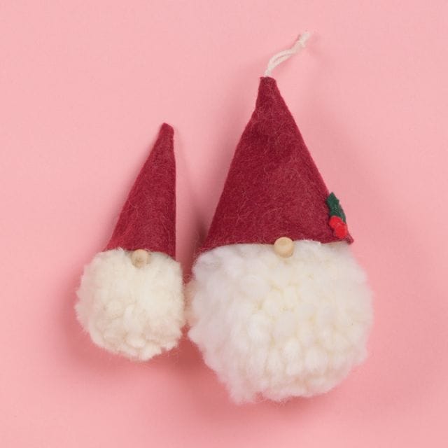 Two gnome pom-pom ornaments.