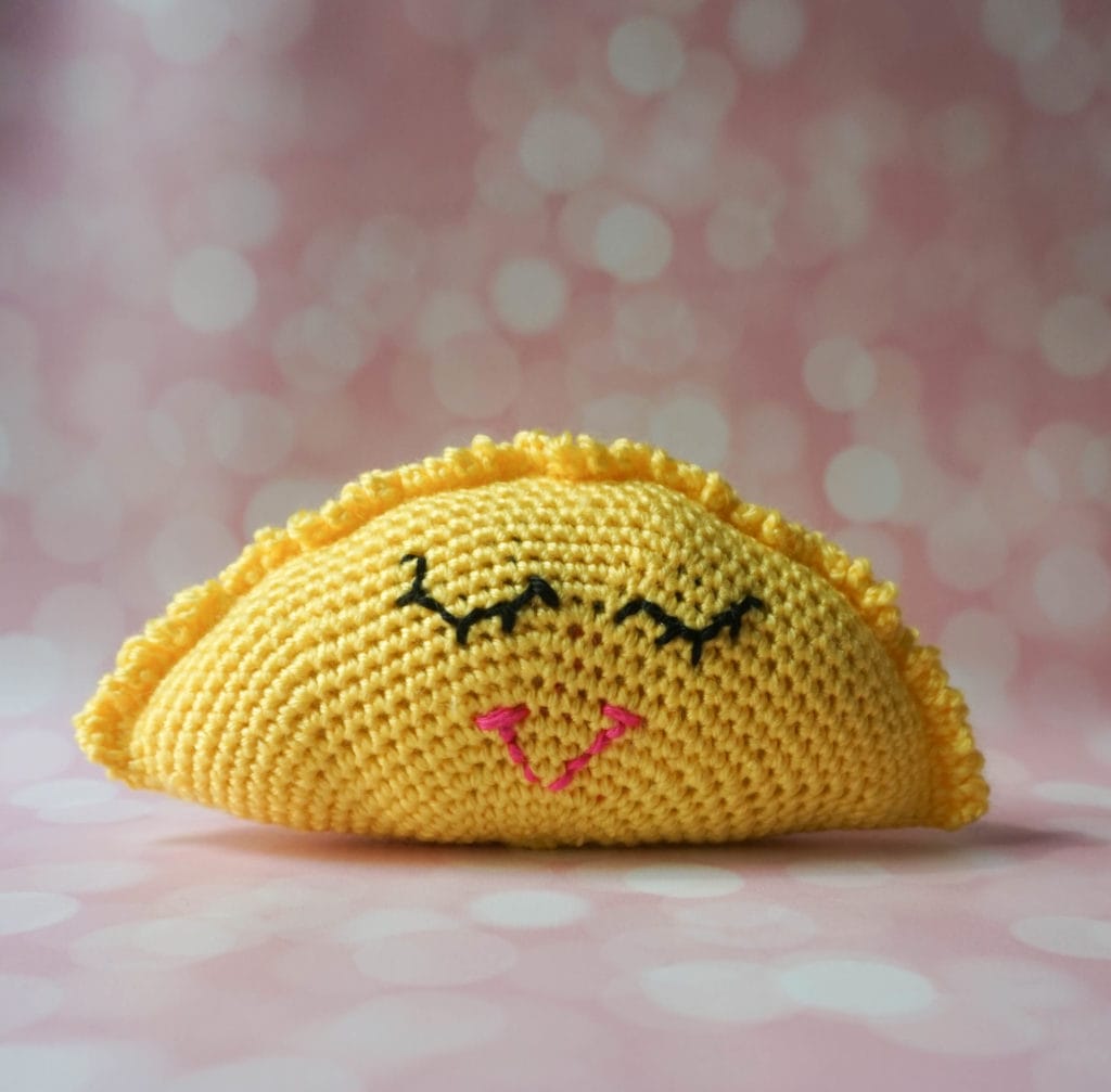 Sleepy Sunrise Amigurumi by Underground Crafter. A half-sun with a face stuffed crochet toy.