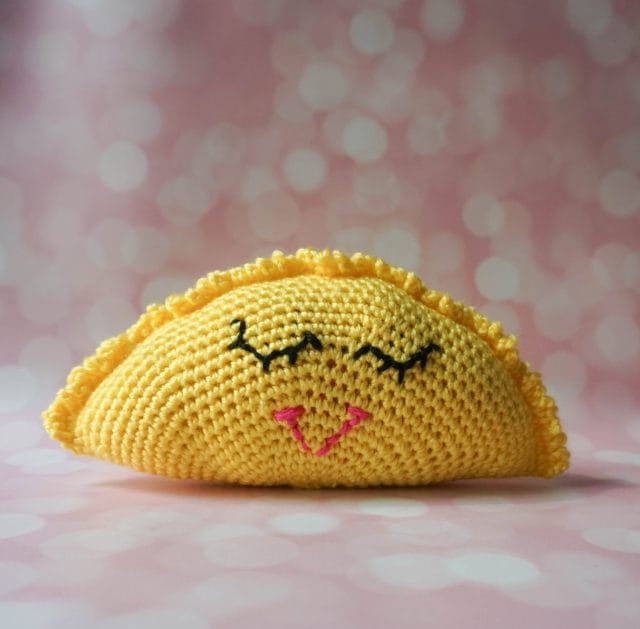 Sleepy Sunrise Amigurumi by Underground Crafter. A half-sun with a face stuffed crochet toy.
