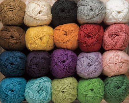 Twenty different colors of Comfy Fingering yarn.