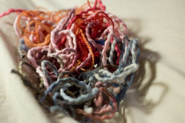 10 Thrifty Crochet Tips from the WeCrochet Blog at crochet.com. This photo shows: a pile of yarn scraps. A photo from Laura Taylor on Flickr.