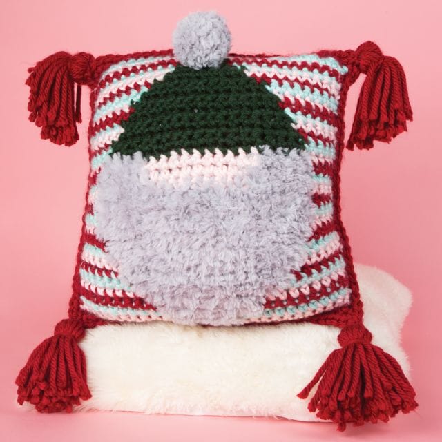 Holiday Gnome Pillow, a free holiday crochet pattern from crochet.com
