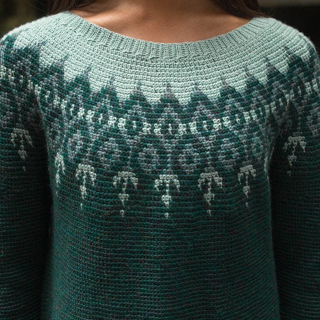 A closeup of a crocheted sweater: The Pulmu Pullover