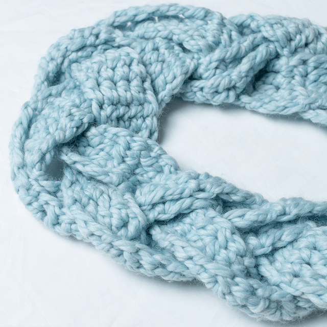 A detail shot of a braided crochet cowl - the Three Wishes Cowl Necklace