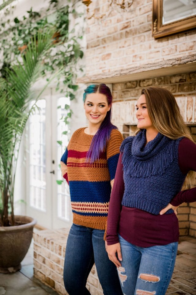 Two models wear crochet sweater designs from Crochet Foundry Magazine, Winter 2020 issue