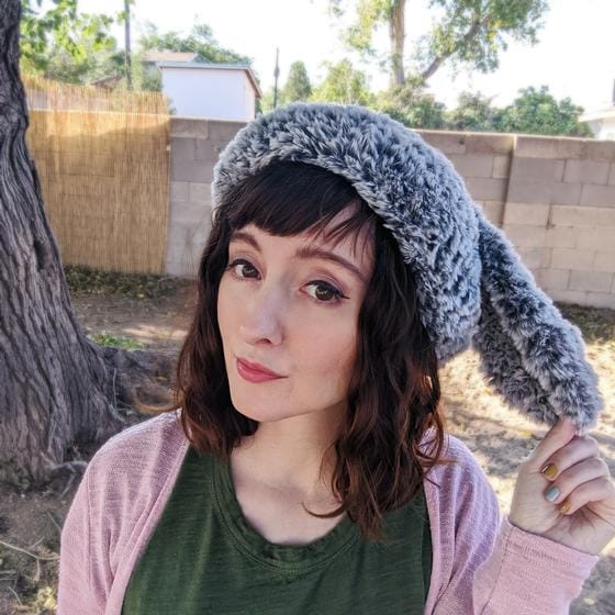 A crocheted beret with bunny ears, made in Fable Fur