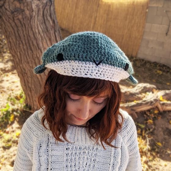 A crocheted whale beanie