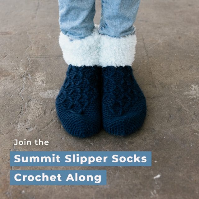 A pair of feet wearing crocheted slippers with a fur cuff. Text that says "Join the Summit Slipper Socks Crochet Along"